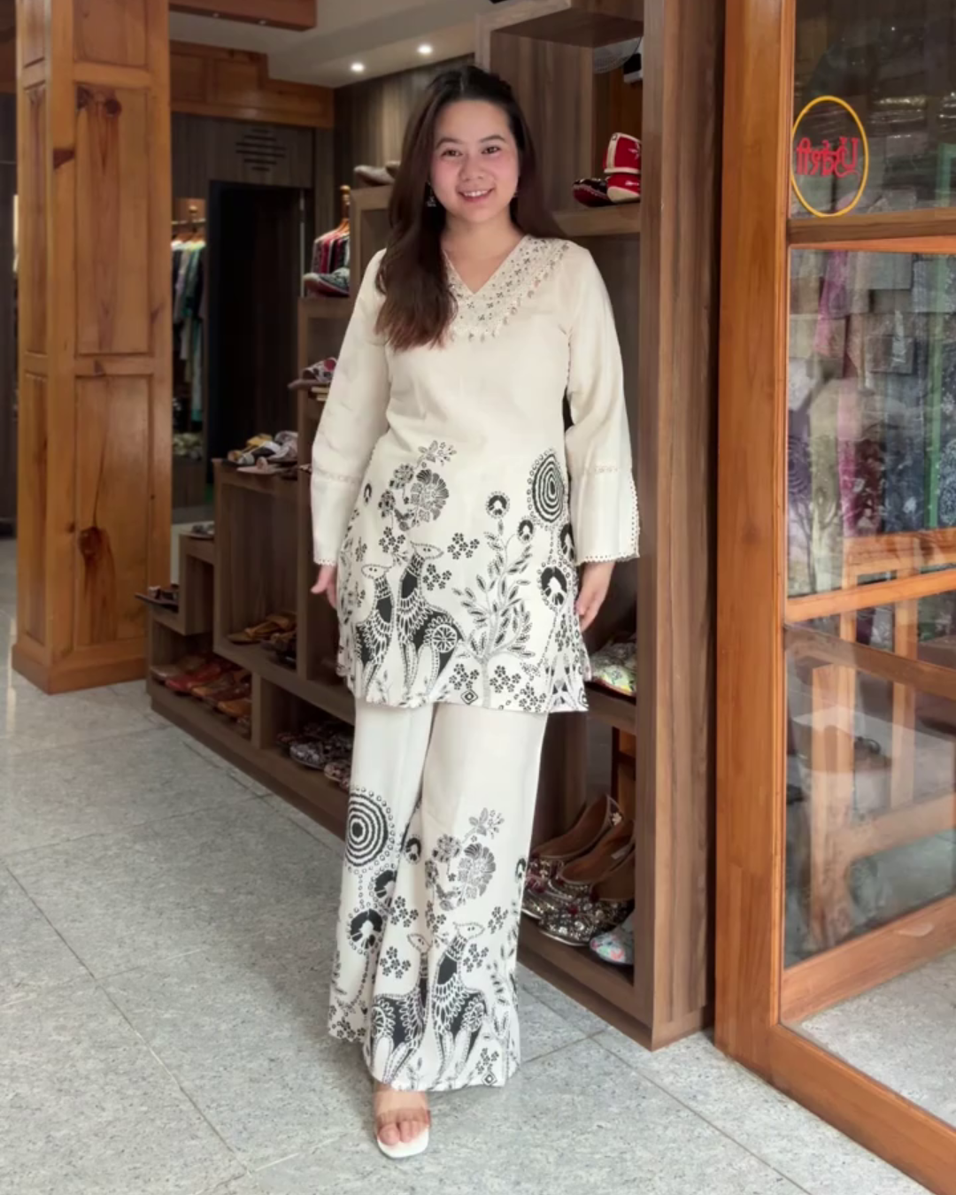 Navya – Ivory Cotton Kurta Set with Shell Neck & Floral Printed Pants - Black
