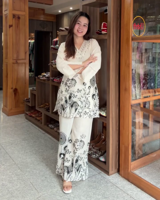 Navya – Ivory Cotton Kurta Set with Shell Neck & Floral Printed Pants - Black